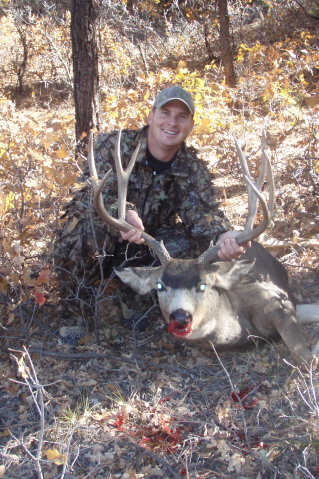 A very proud hunter with his first muley