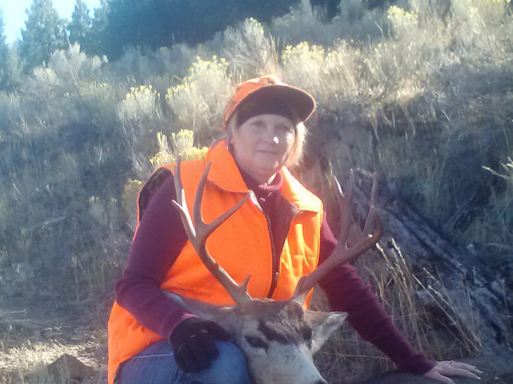 Then this is my mom's buck.  She's hunted for 30 years and has only got 1 other buck.  This one I spotted  from a mile away . We did a 2 hour stalk,  that her and my dad kept thinking would never work.  When we got there,  both bucks were right where we had seen them.  She heart  door this buck at 385 yards!   It was pretty awesome! In fact , my dad is getting it mounted for her.