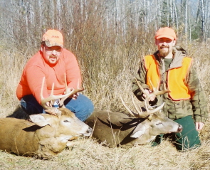 First weekend of MN produced these<br />2 fine bucks the 8 point weighed 191 and the 11+ change weighed 218