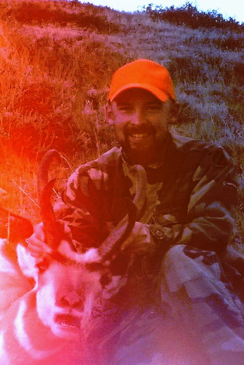 This is my son Mike, he ranged this goat at 278 yards for me....I layed prone using my pack as a rest....my 25-06 did the rest