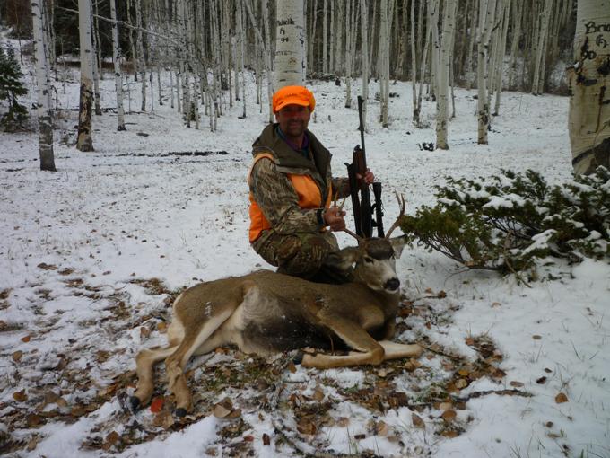 Next day while I was putting my boots on in the tent BOOM! My brother shoots a forked horn buck 50 yards from the tent.