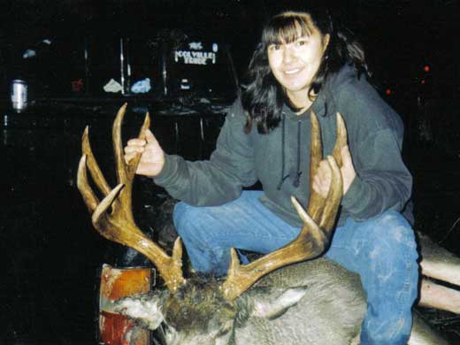 Michelle Nanpuya and her 5x4 mule deer. Shot on the Colville Indian Reservation, Washington State