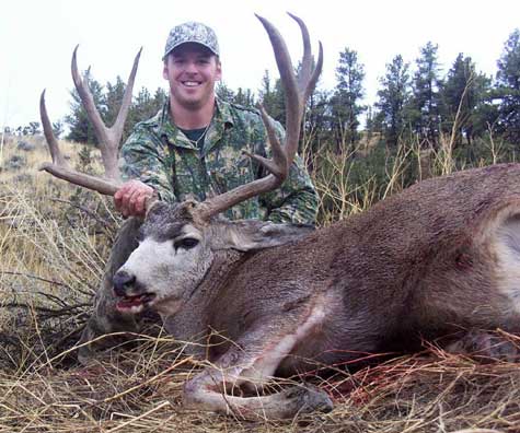 Chris Stevens shot this mule deer on Oct 28, 2003. We were hunting public land in Eastern Montana. The deer is a 6x6 and has a 2