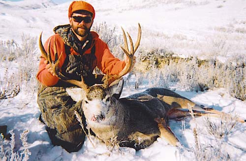 Opening day November 2003 South Dakota Mule Deer. 26 1/4 inside spread.