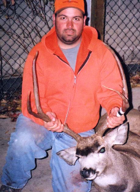 Jason Jaramillo harvested this unusual buck during the 2002 rifle season.
Way to go primo!!