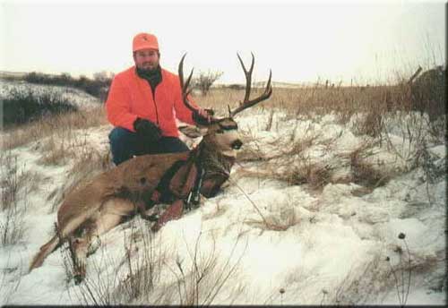 David Paul took his 1st mule deer in Carson, ND with a 7mm.  He is 25 1/2&amp;quot; wide.